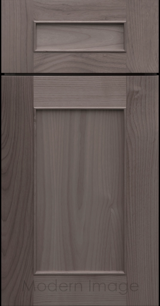 Detail view of a Chandler Shaker cabinet door in Truffle stain with raised molding along the inner panel.
